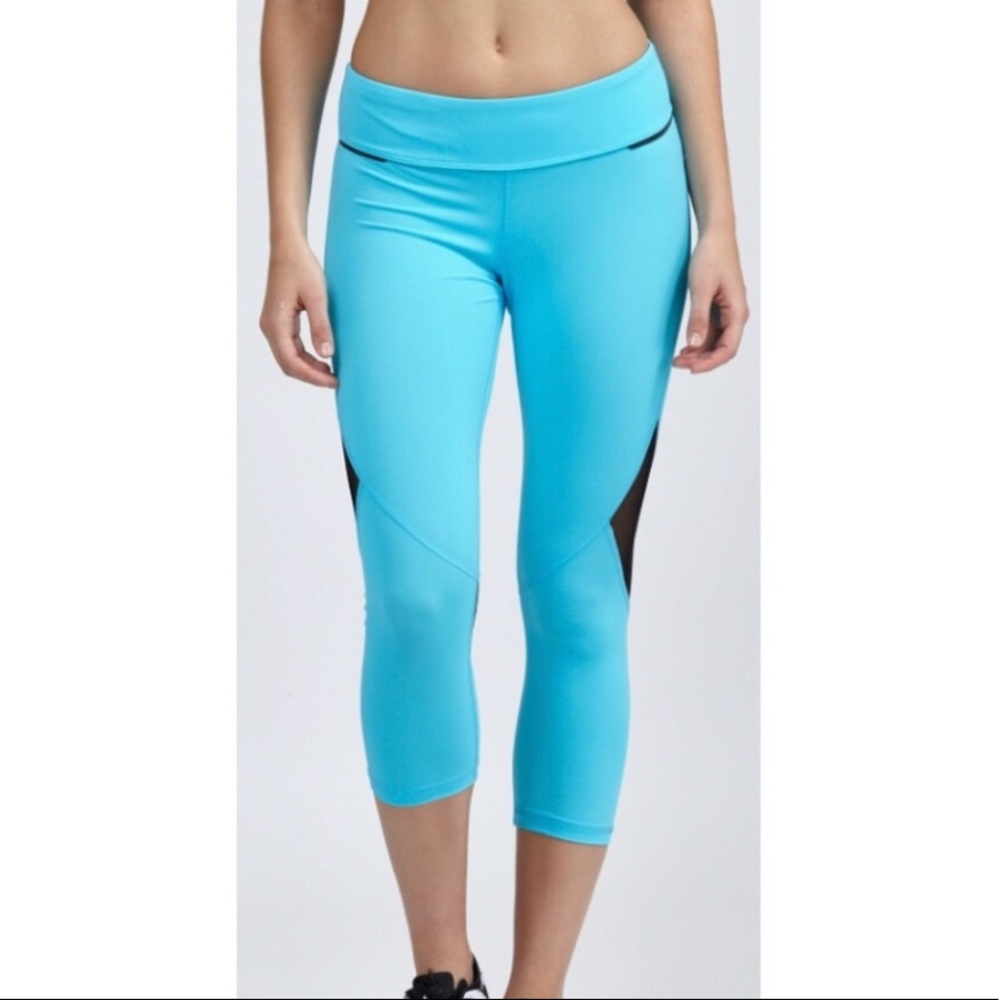 ALALA turquoise captain crop tight